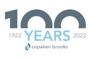 Copaken Brooks 100 year logo featuring the number 100, the word Years, the company name and the years 1922 and 2022